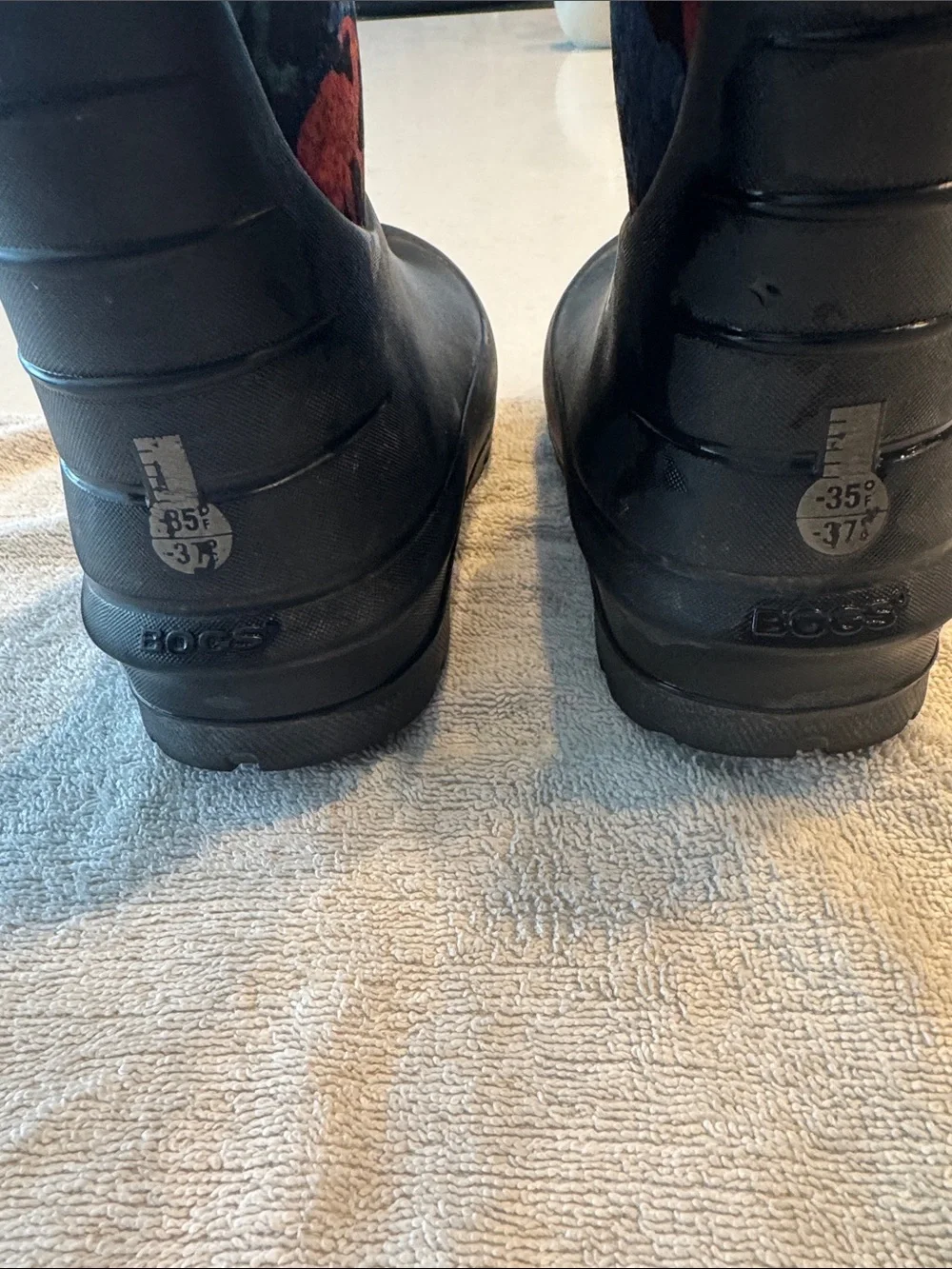 Bogs Kids Black Rain Boots with Red, Blue & Green Dinosaurs